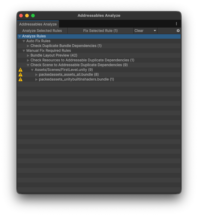 The Addressables Analyze window displaying expanded lists of auto fix and manual fix required rules.