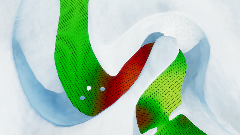 An aerial view of a winding river, with small arrows on the water surface that represent the current direction.