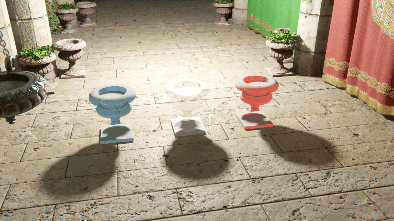 Three different colored GameObjects with ray traced Point Light shadows that aren't semi-transparent.
