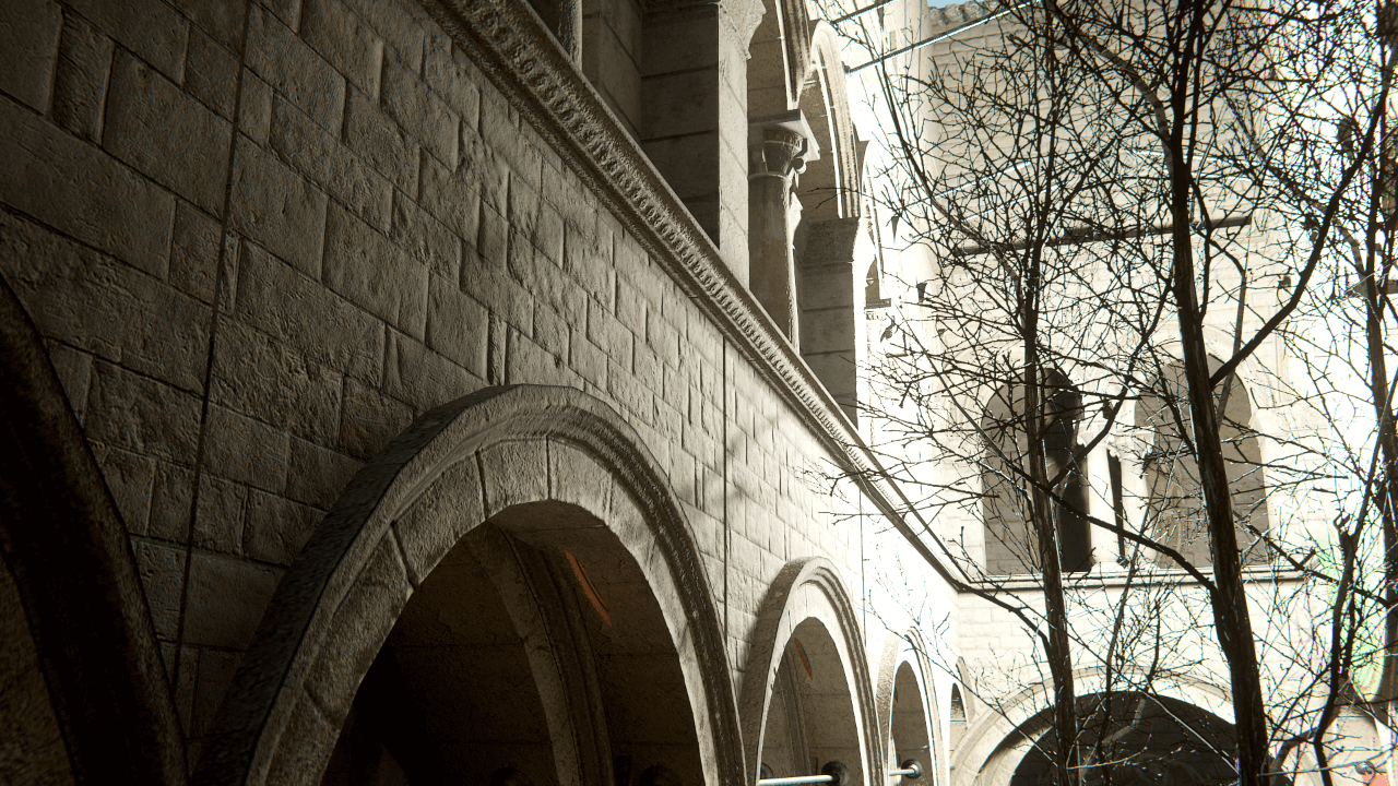 An outdoor scene of a wall and trees, with a Point Light shadow map.