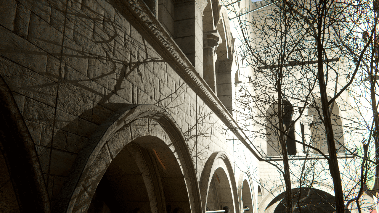 An outdoor scene of a wall and trees, with ray traced Point Light shadows of a radius of 0.001m. The shadows of the trees are sharp and visible on the wall.