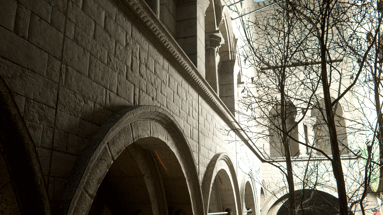 An outdoor scene of a wall and trees, with ray traced Point Light shadows of a radius of 0.05m. The shadows of the trees are no longer visible on the wall.