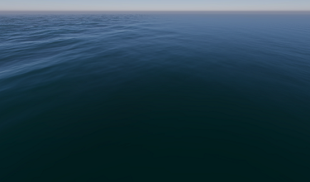 A mostly flat ocean with a gentle pattern of waves and ripples.
