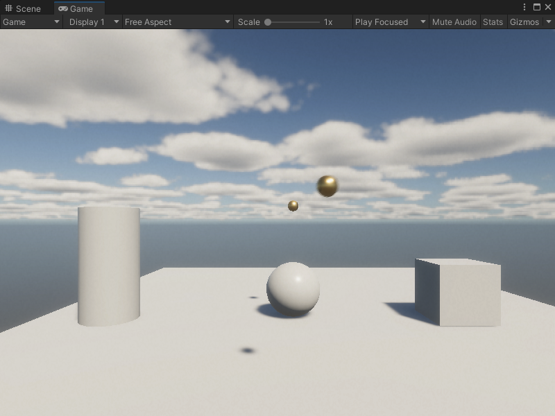 An image of the Game view, that displays two instantiated Ball GameObjects flying towards the camera in a basic scene.