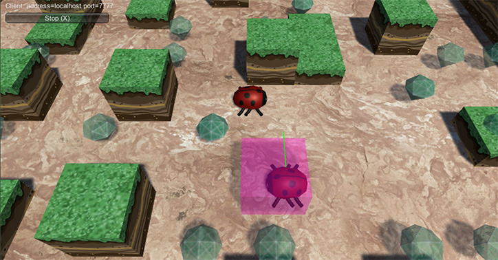 この画像では、 Network Transform Visualizer は、マゼンタ色のキューブによってゲーム内で受信したリモートプレイヤーの Transform データを表示しています。