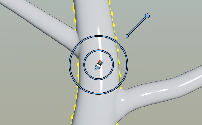 The Vertex Colors brush surrounded by an inner and outer ring and a bar over a selected node.